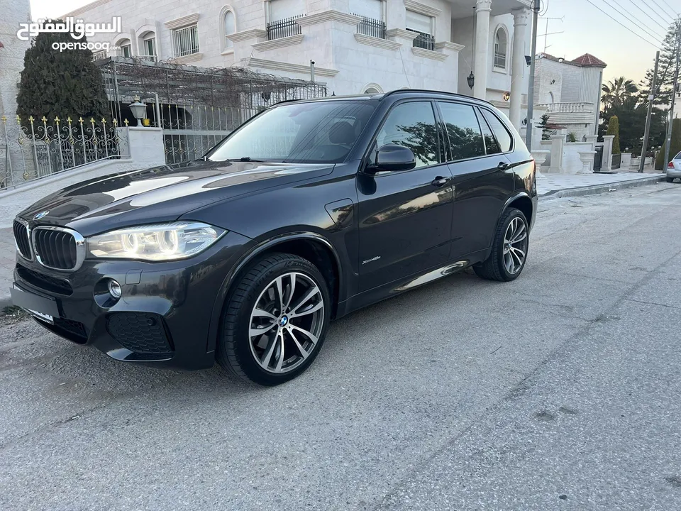 بي ام دبليو X5 بلج ان وارد وكاله عمان  فل كامل فحص كامل بحاله الوكاله دهان الشركه