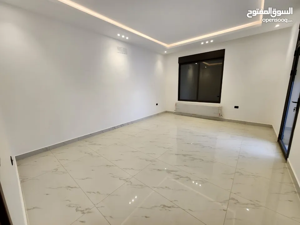 شقة مع روف دوبلكس للبيع على طريق المطار ( البنيات )  ref : 14367