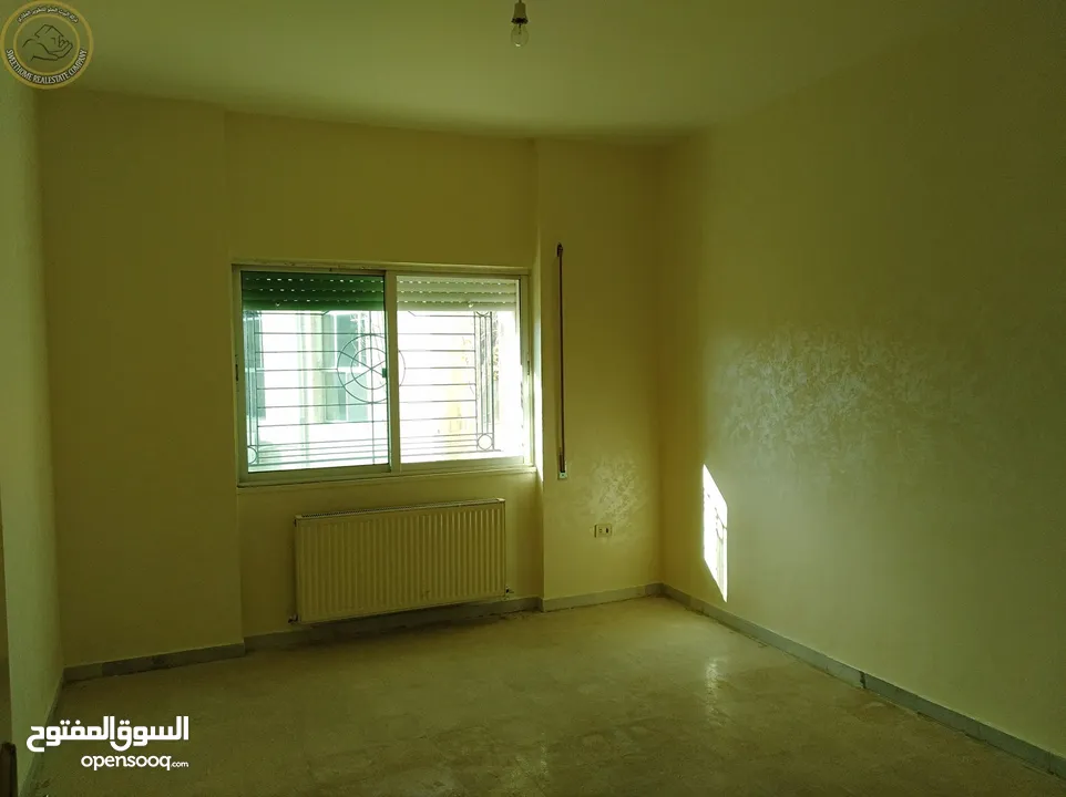 شقة أرضية مميزة للبيع في خلدا  - خلف الموفنبيك وقرب لاكي 210م مع حديقة وترسات 80م