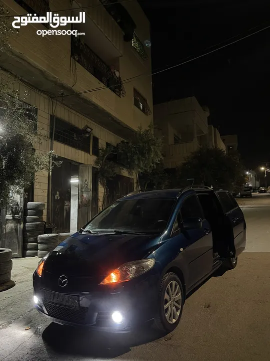 مازدا 5 جير عادي 6+1 متور 2000 بنزين رخصه و تامين جديد  عداد قليل فحص نخبب سعرر كااششش