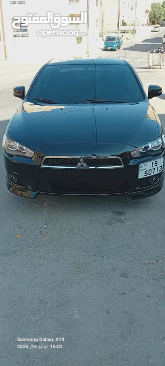 متسوبيشي لانسر فراشة موديل 2015 فحص مرفق مع الصور بحالة الوكاااااالة  ماشية 49 الف km  أصلي