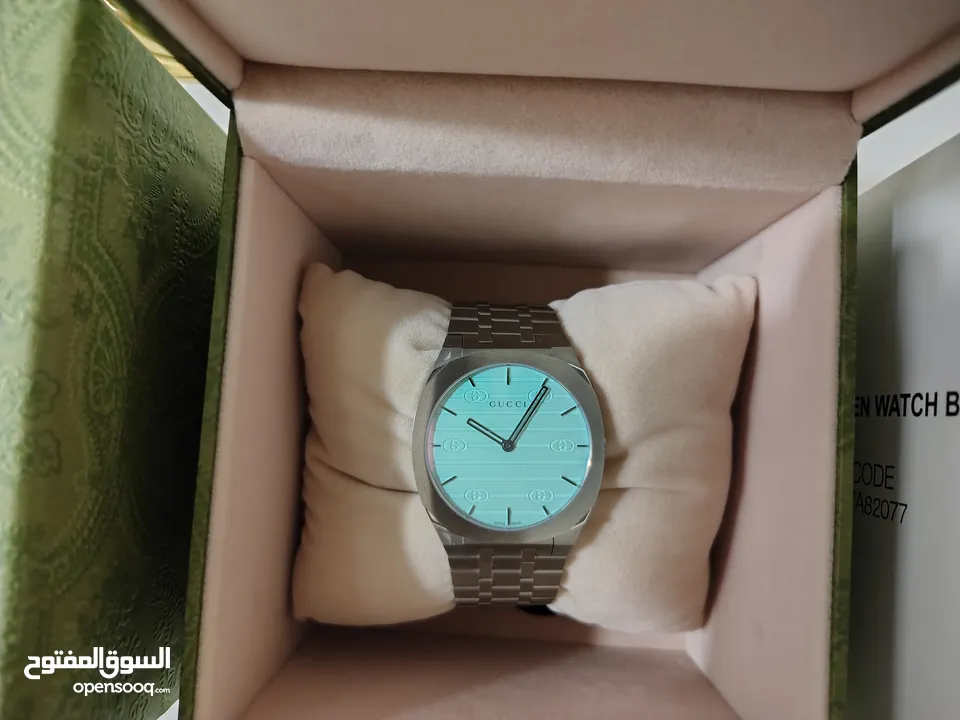 ساعه GUCCI  25H  قياس  38  بحالة الوكاله وتحت الكفاله لون تيفاني ،(ازرق بحري).ultra slim
