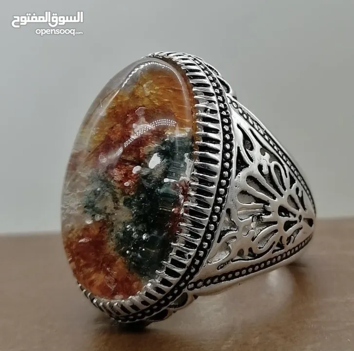 خاتم فضة من العيار الثقيل عيار 925 فعلي متوج بتحفة من الدر النهري التي لن تتكرر