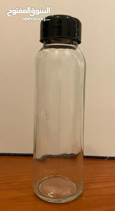 عدد 24) زجاجات زجاجية أنيقة مع أغطية )Elegant glass bottles with covers