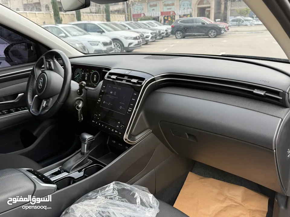 هونداي توسان ترخيص 2021 محرك 1600 بنزين+بطاريه مساعده دفع 4*2 جير أوتوماتيك 180 حصان