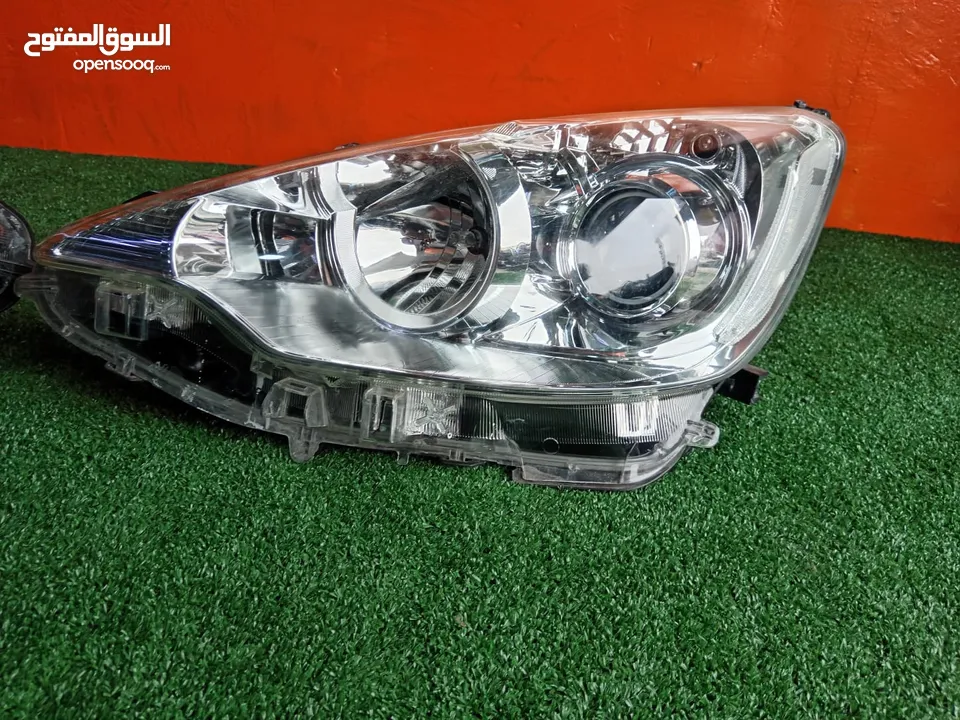 اضوية امامية تويوتا بريوس سي موديل2012-2014 ‏  2012 Toyota prius C  مستعمل اصلي وارد اليابان