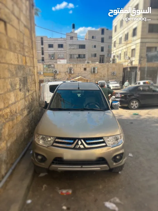 تندر متسبيشي L200 دفع خلفي 4x2 الحالة نظيف و السعر قابل لتفاوض مطور قير نظاف نظاف