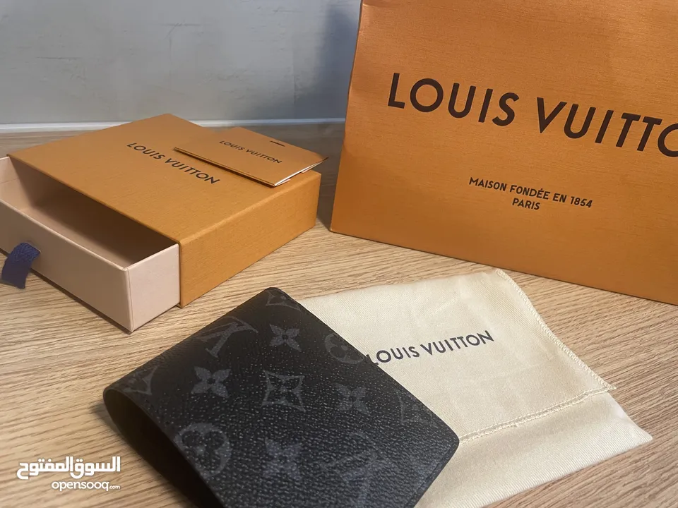 Louis Vuitton  Slender Wallet Monogram Eclipse   محفظة لويس فيتون الأصلية