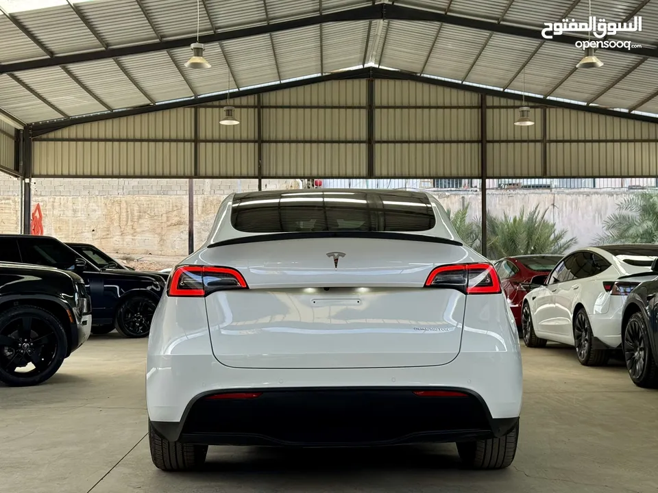 Tesla Model Y 2022 ( LONG RANGE DUAL MOTOR )  فحص الشريف  7 جيد  ، B+ اوتوسكور ايرباج مغلق غير مفتوح