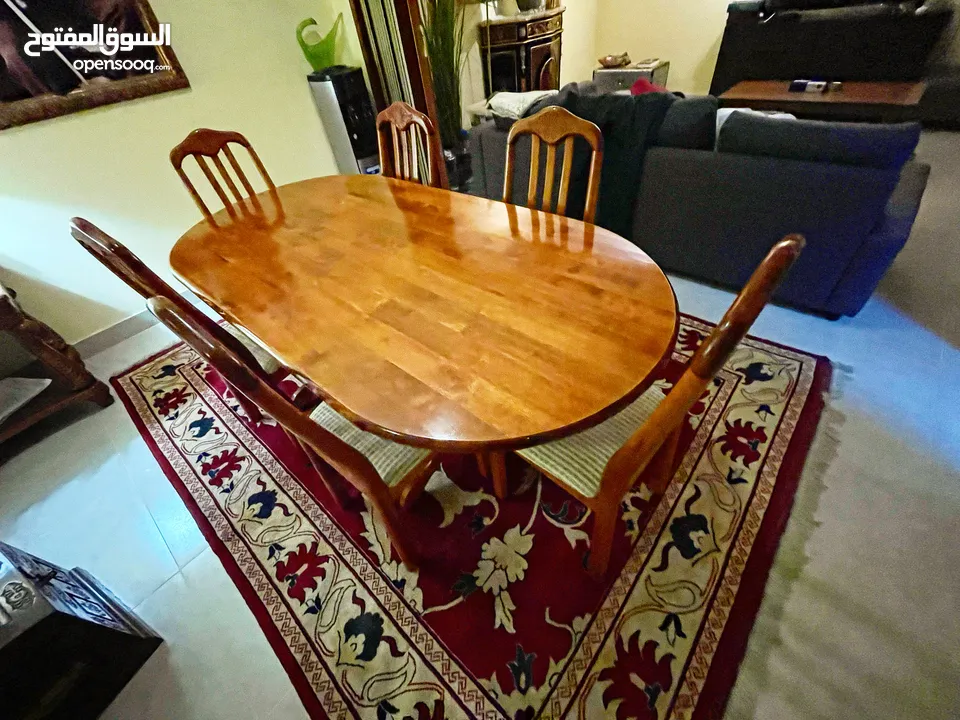Wooden dining table and six chairs