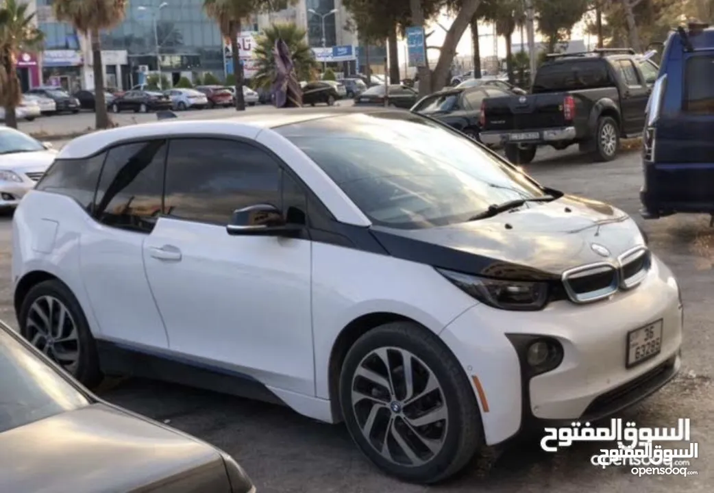 BMW i3 كهرباء بدون بنزين تيرا للبيع او بدل ع بكم حديث  ممكن البدل ع بكم عالي دوج او فورد 2015