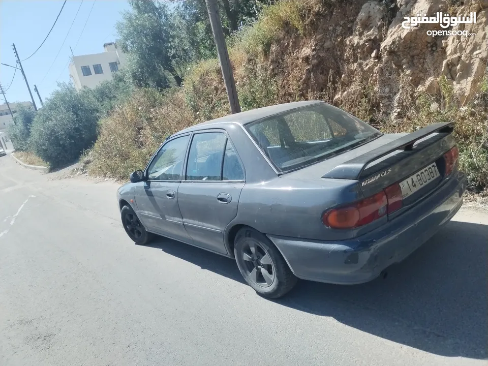 اللهم صلي على سيدنا محمد لانسر ال 1993 سياره معروفه اقتصاديه محرك 1500 صينيه ودسك جداد حيلها فيها