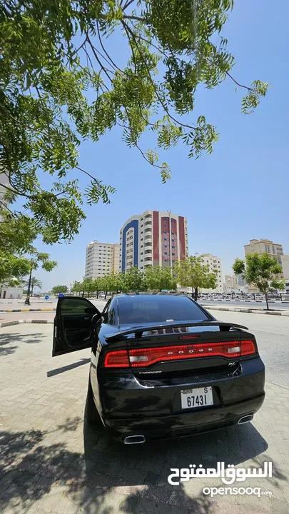 Phantom black edition dodge charger for sale with red and black interior, well maintained,