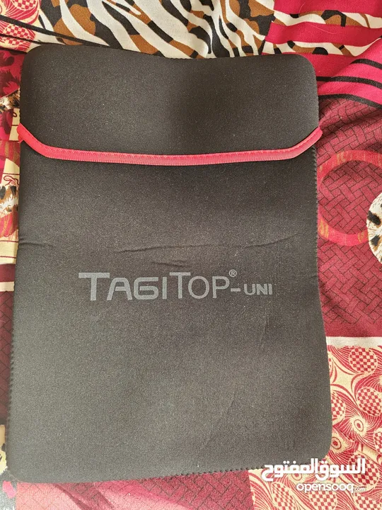 laptop TAGTECH   TAGITOP-UNI  مستعمل بحالت الجديد  عليه خدوش من الخلف