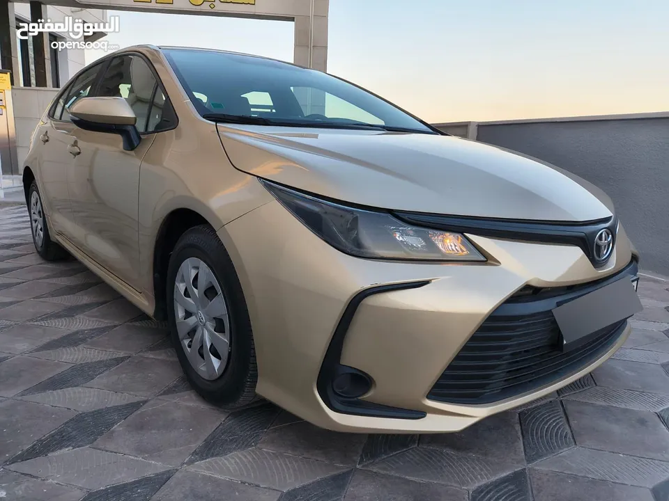 تويوتا كورولا 2021 لون شمباني بنزين اصلي ماتور cc1600 فحص كامل جمرك حديث