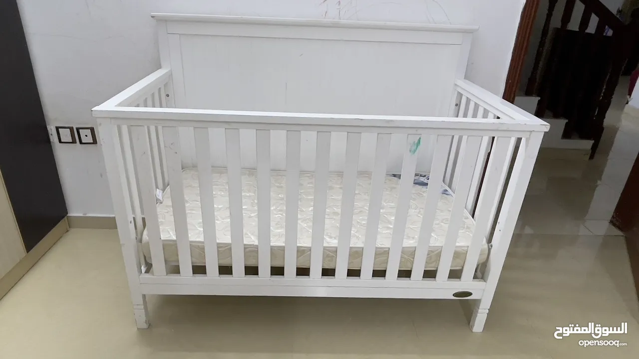 Baby shop wooden cot with Raha spring mattress and baby shop oscillating chair