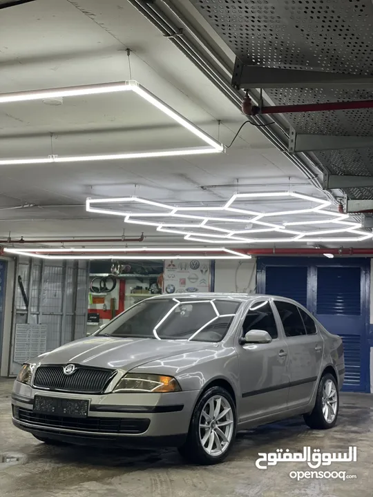 سكودا اوكتافيا بنزين اوتماتيك اصل حكومي مطور 1.6 بحالة الوكاله موديل 2007