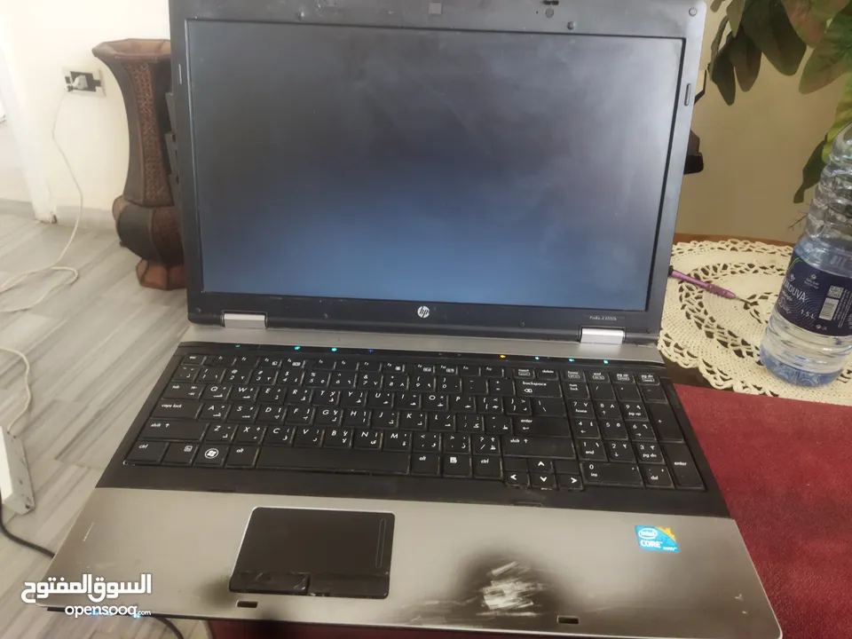 لابتوب كور اي 7 معه شاحن رقم شغال بلوصف