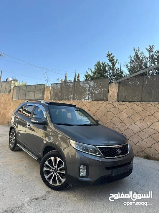 كيا سرنتو 2015ترخيص2014 للبيع المعني حيا الله ترخيص وتأمين هديه سنه الجب بحاله ممتازه  فل الفل الجيب