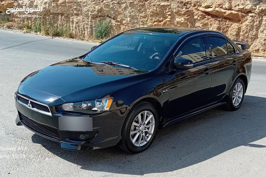 متسوبيشي لانسر فراشة موديل 2015 فحص مرفق مع الصور بحالة الوكاااااالة  ماشية 49 الف km  أصلي