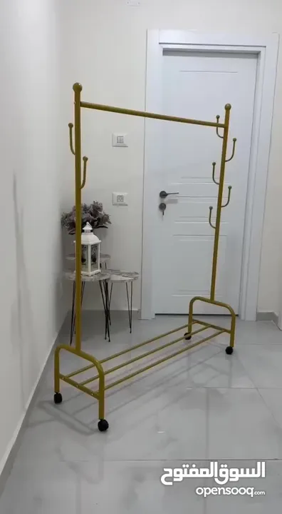 ستاند ملابس واحذيه