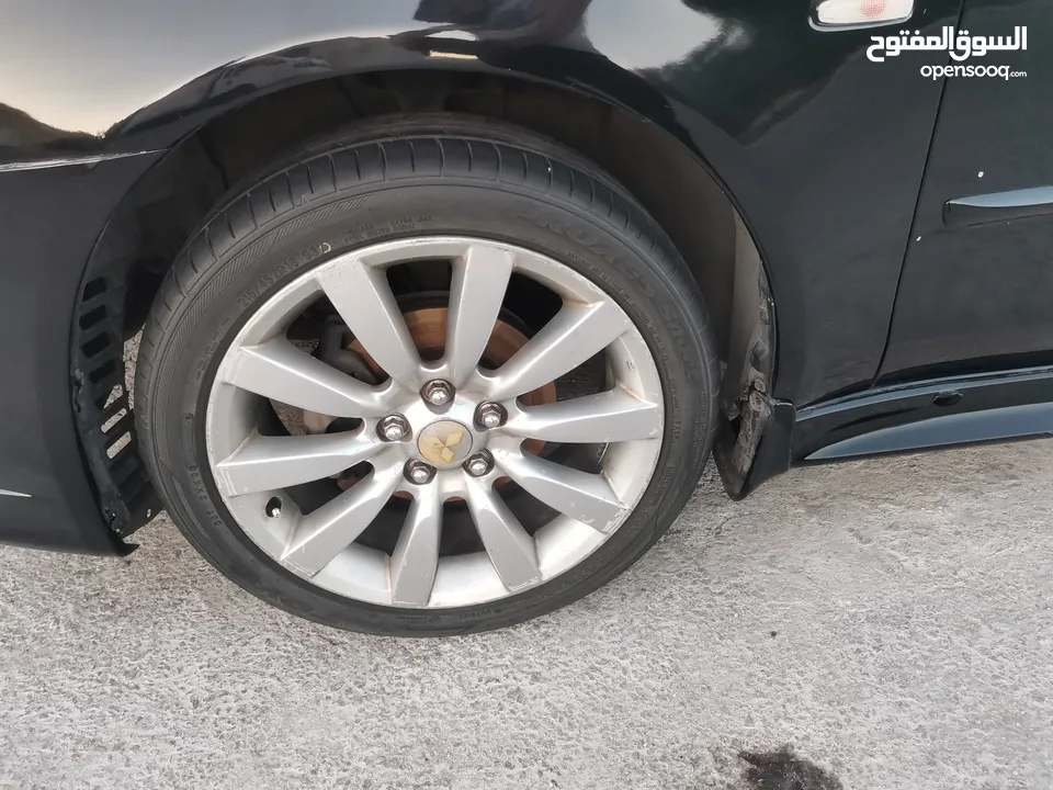 جنط لانسر ex gt 18 مع كوشوك تويو جديد