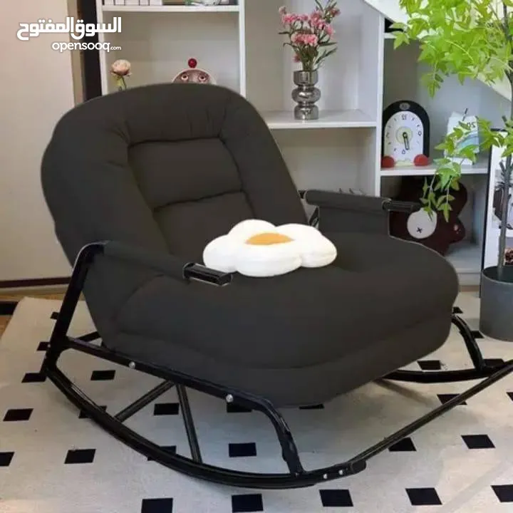 كنبة هزاز طبية مع مخدة لون اسود و اصفر