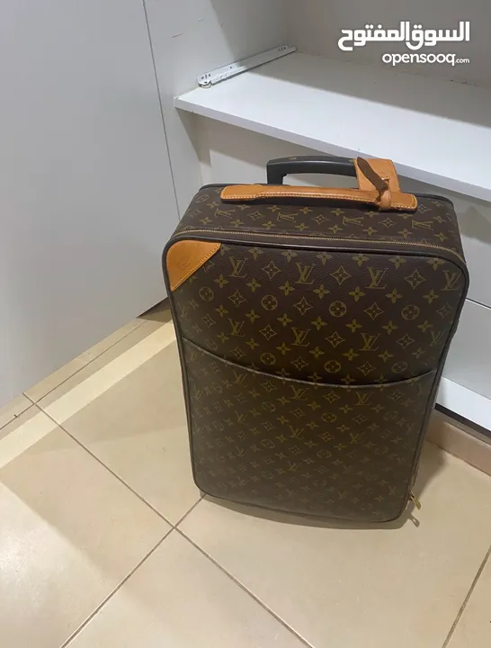 Louis Vuitton travelling suitcase