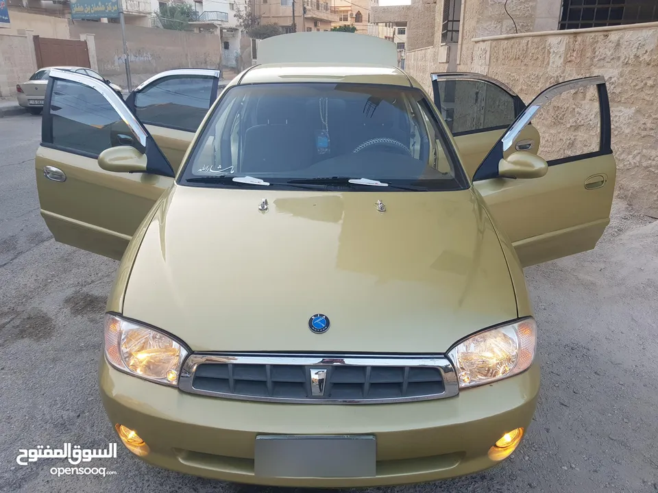 كيا سبكتر توماتيك اقساط دفعة 1200 دهان جديد  ماتور جديد  قير جيد  فحص مرفق  مكانيك سيارة مشية ناعمة