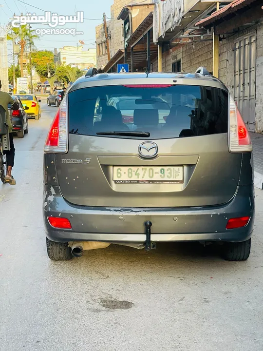 مازدا 5 ستيشن بابين سحاب ماتور 2000cc بدون تيربو هيك بجين هضول كراسي اماميات تدفئه كزاز كهرباء بنزين