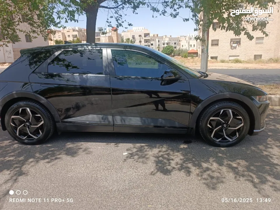 سياره موديل 2022 ايونك 5 كهربائيه لون اسود ميتاليك دفع رباعي اكبر بطاريه تمشي فوق 550 كيلو سبعه جيد