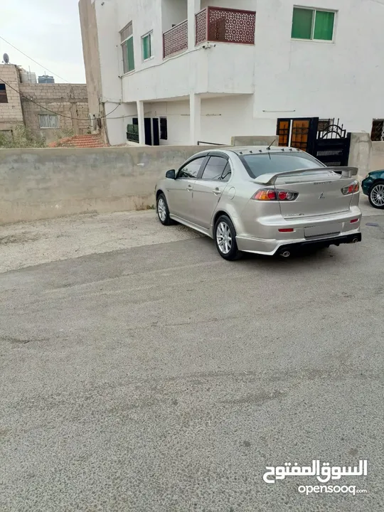 ميتسوبيشي لانسر 2015 بحالة الوكالة ترخيص سنه كامله