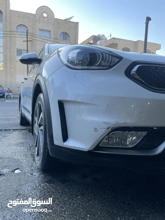 كيا نيرو 2019 -الاتصال على رقم الوطنيه في الوصف