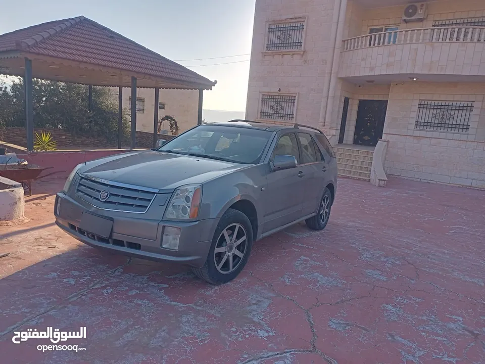 كاديلاك موديل 2004 بحالة الوكاله مرخصة لشهر 12 ماتور جديد بيان جمركي ما نزل ع رخصه لسه
