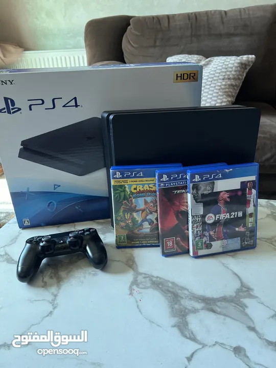 للبيع: PlayStation 4 Slim بحالة ممتازة + إيد أصلية + 15 لعبة.