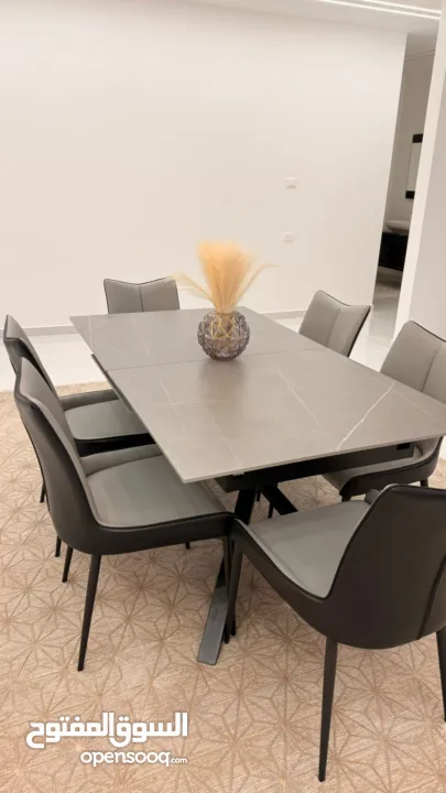 طاولة سفرة مودرن/ سيراميك كراسي جلد قوي وسميك