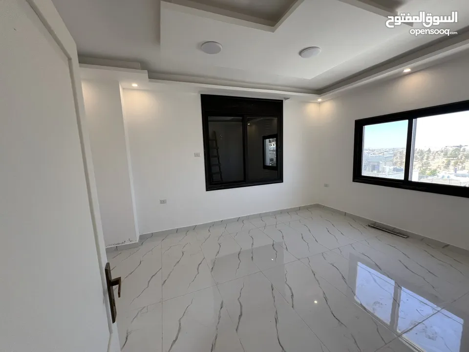 عمارة للبيع أربع شقق طابقية مساحة الشقة 148 متر في ماركا الشمالية قرية خالد بن الوليد