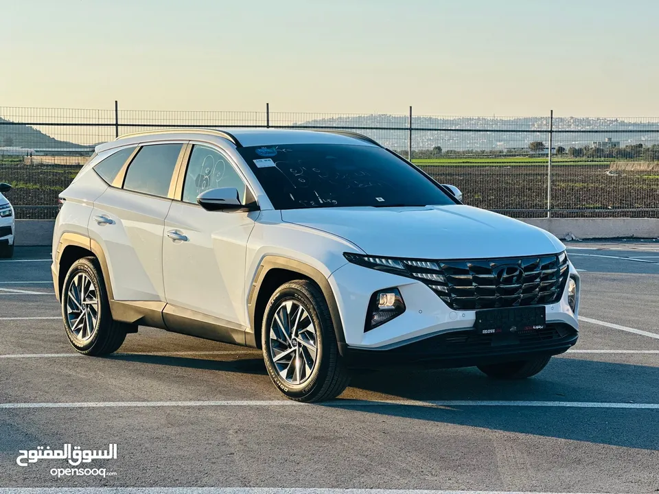 هونداي توسان هايبرد ترخيص 2022 ماشية فقط 24 الف ولا غرام بوية وبحالة ممتازة جدا