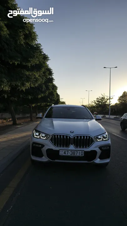 BMW X6 X DRIVE 400i 2022بحالة الوكالة