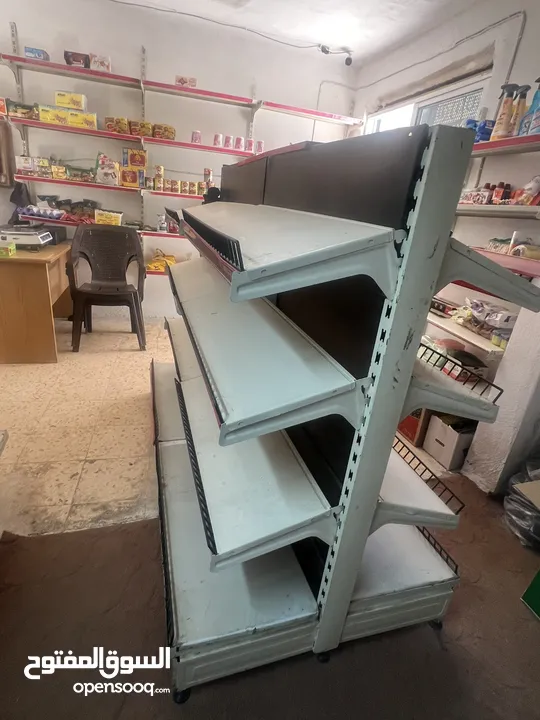 ستاند دكانه + 20 رف مع الحماله ب 150 دينار قابل للتفاوض
