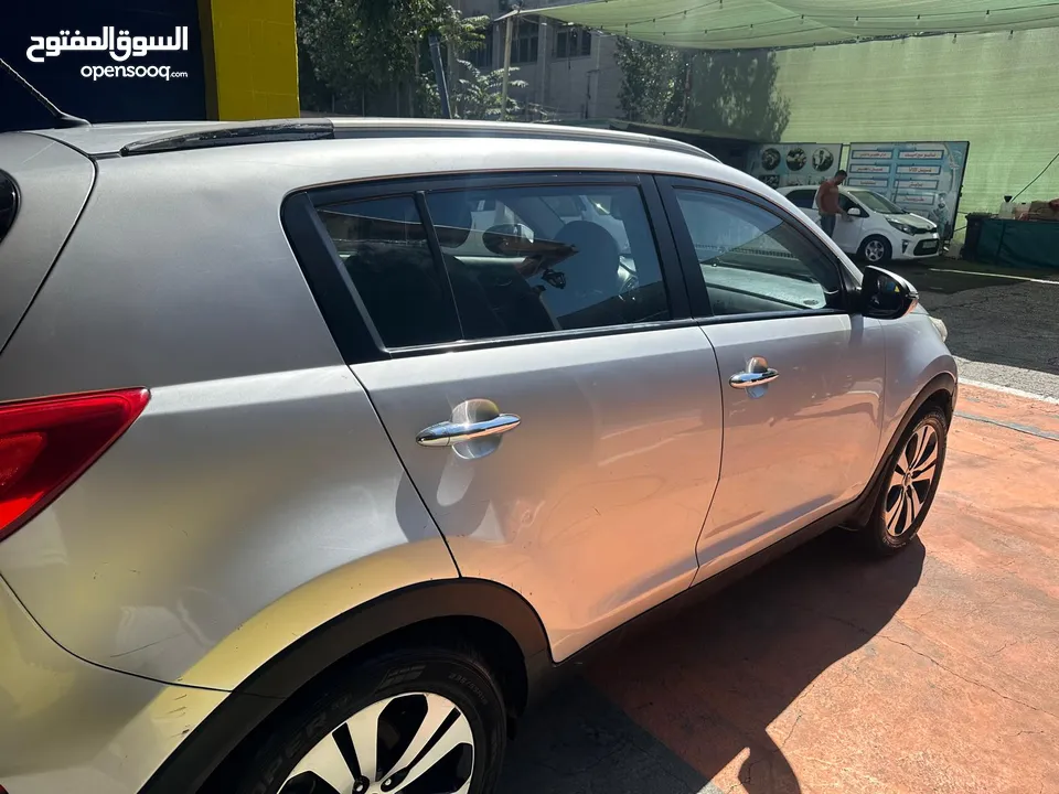 كيا سبورتاج2011 ديزل دفع رباعي ترخيص وتامين سنه فل اضافات بدون فتحه خاليه من الحوادث البيع كاش فقط