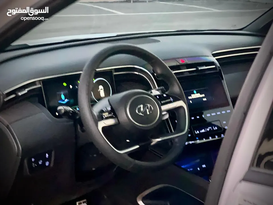 هونداي توسان 2023/ فل الفل فتحة سقف بانوراما  2x4 ///240Hp بنزين + كهرباء  ( Haybrid) 1600cc