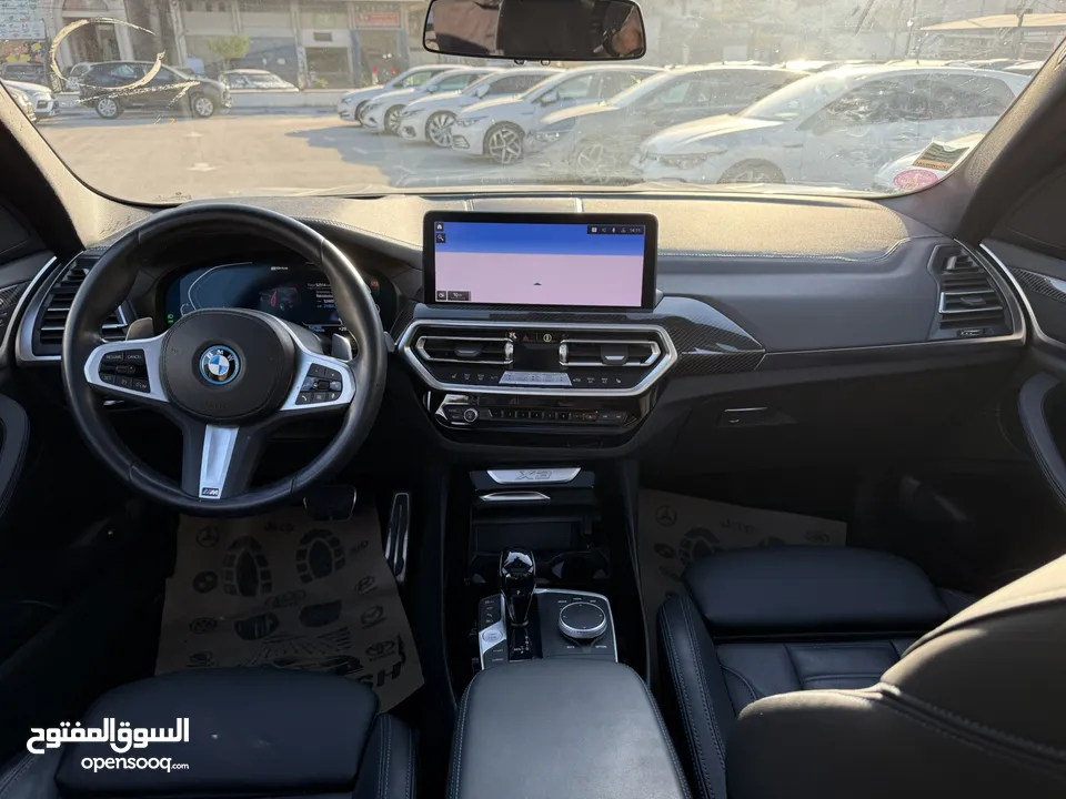 BMW x3 30e ترخيص 2022 ترخيص  محرك 2000 هايبرد plug in/يقطع على الشحنه 30 كيلو متر  293 حصان