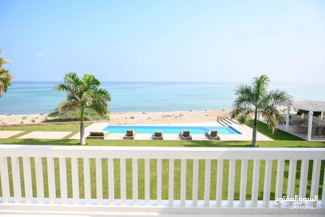 Luxurious 5BR beachfront Villa with private pool and Marina access available for Sale in Jebel Sifah