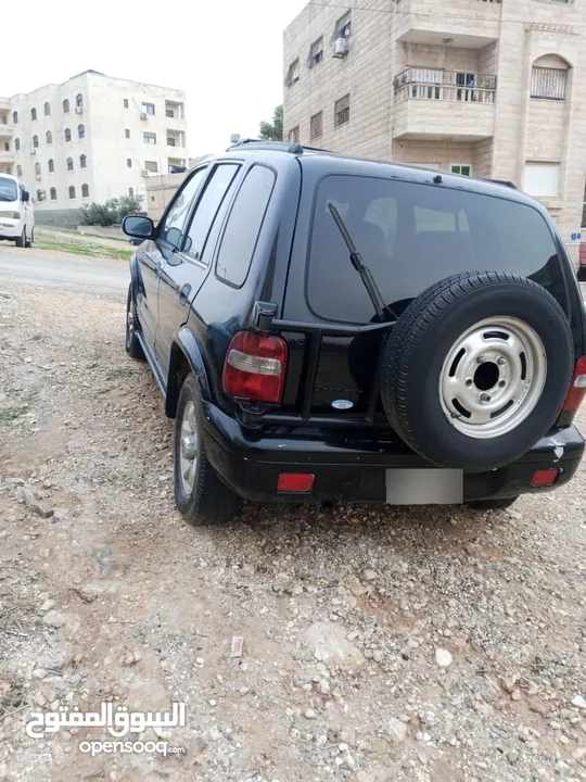 كيا سبورتج 2001 لون اسود للبيع