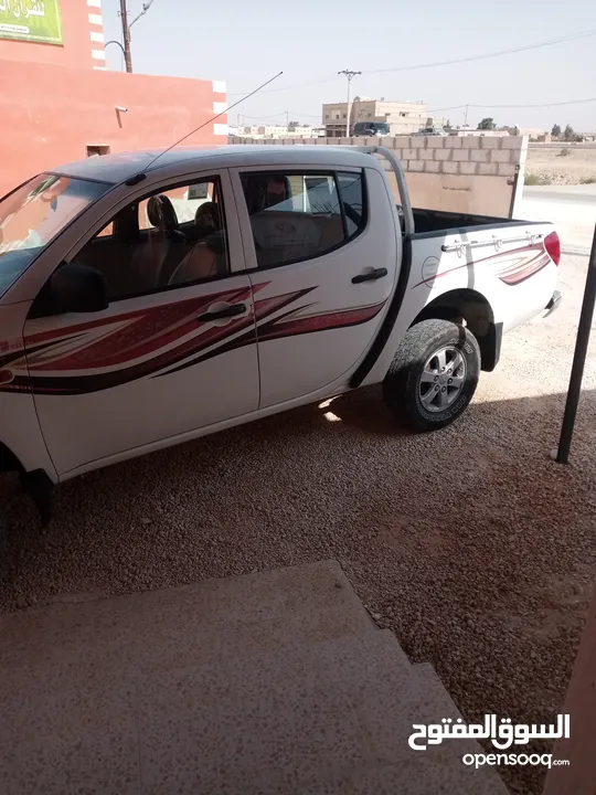 بك اب متسوبيشي   l200 موديل 2009 فور ويل 4X4