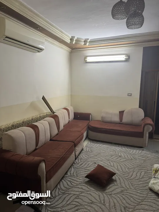 طقم كنب وطاولة تلفزيون