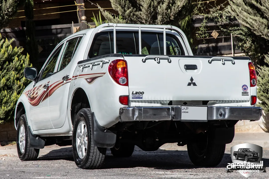 Mitsubishi L200 2012  البكب مميز جدا و قطع مسافة 143,000 كم