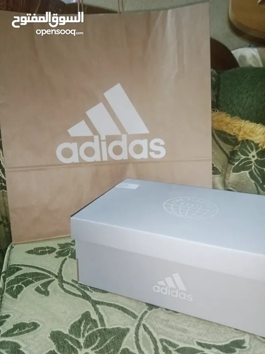 حذاء adidas UltraBoost 22 Black Flash Orange اصلي بنص سعره بسعر مغري جدا الفضل للمشي والراحة