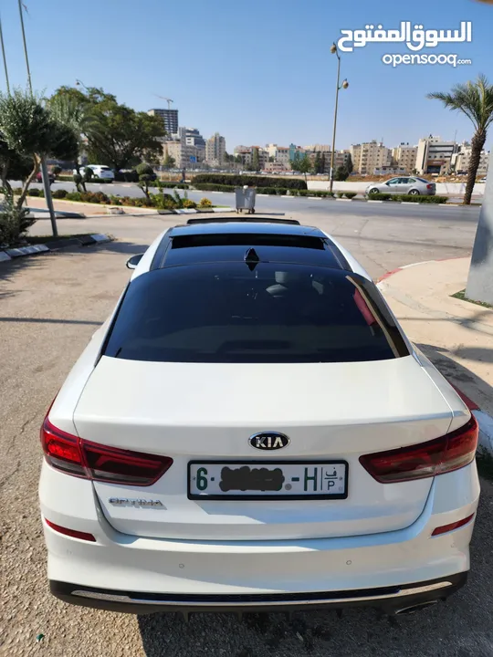 Kia Optima 2018 — لون أبيض لؤلؤي تحفة